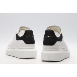 AMQ white oversized sneakers with black heel