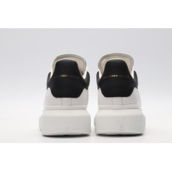 AMQ white oversized sneakers with black heel