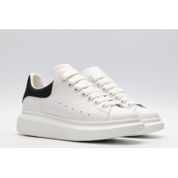 AMQ white oversized sneakers with black heel