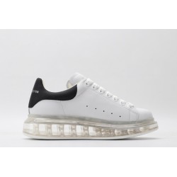 AMQ white oversized sneakers with black heel