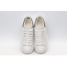 AMQ white oversized sneakers with black heel