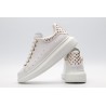 White calf leather lace-up sneaker with gold-finished hammered stud