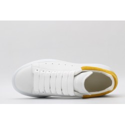 AMQ oversized sneakers with yellow heel