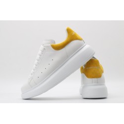 AMQ oversized sneakers with yellow heel