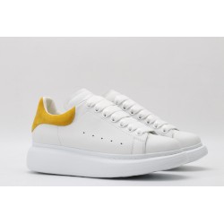 AMQ oversized sneakers with yellow heel