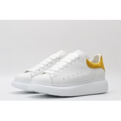 AMQ oversized sneakers with yellow heel