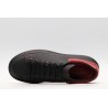 AMQ black oversized sneakers with red heel