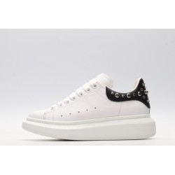 White calf leather lace-up sneaker trimmed with contrasting-color black calf leather heel