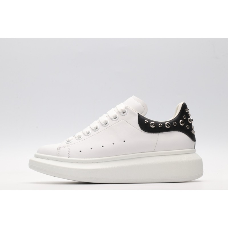 White calf leather lace-up sneaker trimmed with contrasting-color black calf leather heel