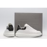 White calf leather lace-up sneaker trimmed with contrasting-color black calf leather heel