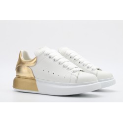 AMQ oversized sneakers with gold heel