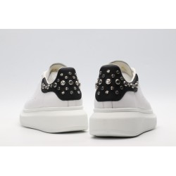 White calf leather lace-up sneaker trimmed with contrasting-color black calf leather heel