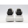 White calf leather lace-up sneaker trimmed with contrasting-color black calf leather heel