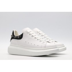 White calf leather lace-up sneaker trimmed with contrasting-color black calf leather heel