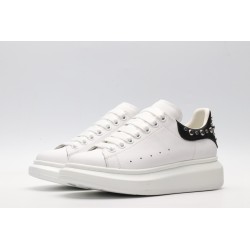 White calf leather lace-up sneaker trimmed with contrasting-color black calf leather heel