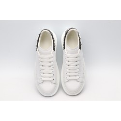 White calf leather lace-up sneaker trimmed with contrasting-color black calf leather heel