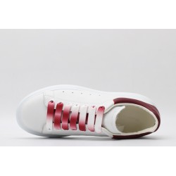 AMQ oversized sneakers with red heel