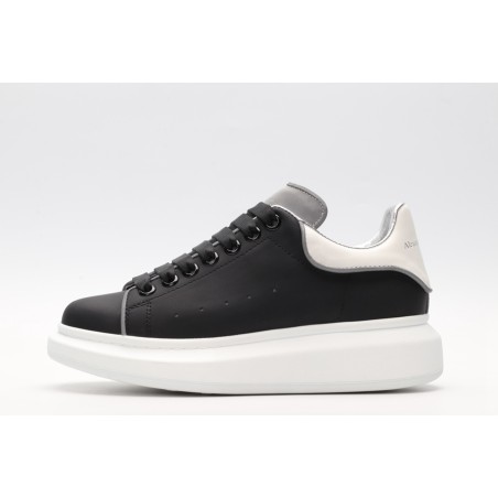 AMQ black oversized sneakers with siL*Ver heel