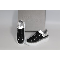 AMQ black oversized sneakers with siL*Ver heel