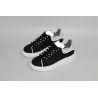 AMQ black oversized sneakers with siL*Ver heel