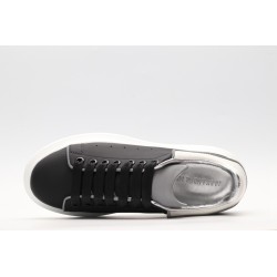 AMQ black oversized sneakers with siL*Ver heel