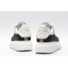 AMQ black oversized sneakers with siL*Ver heel