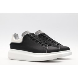 AMQ black oversized sneakers with siL*Ver heel