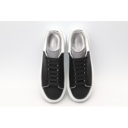 AMQ black oversized sneakers with siL*Ver heel